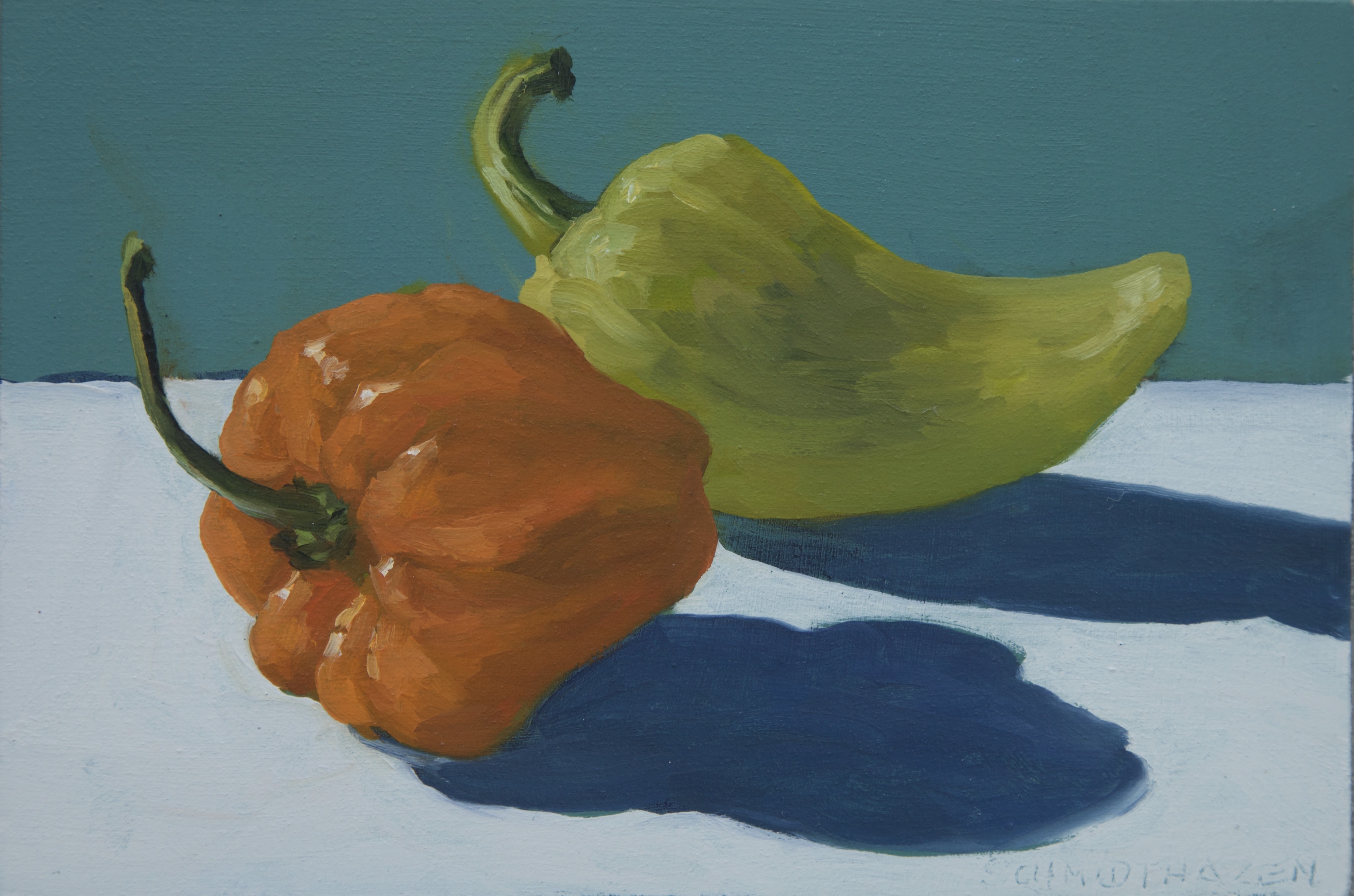 1 green, 1 orange chile, sea green background with blue shadows