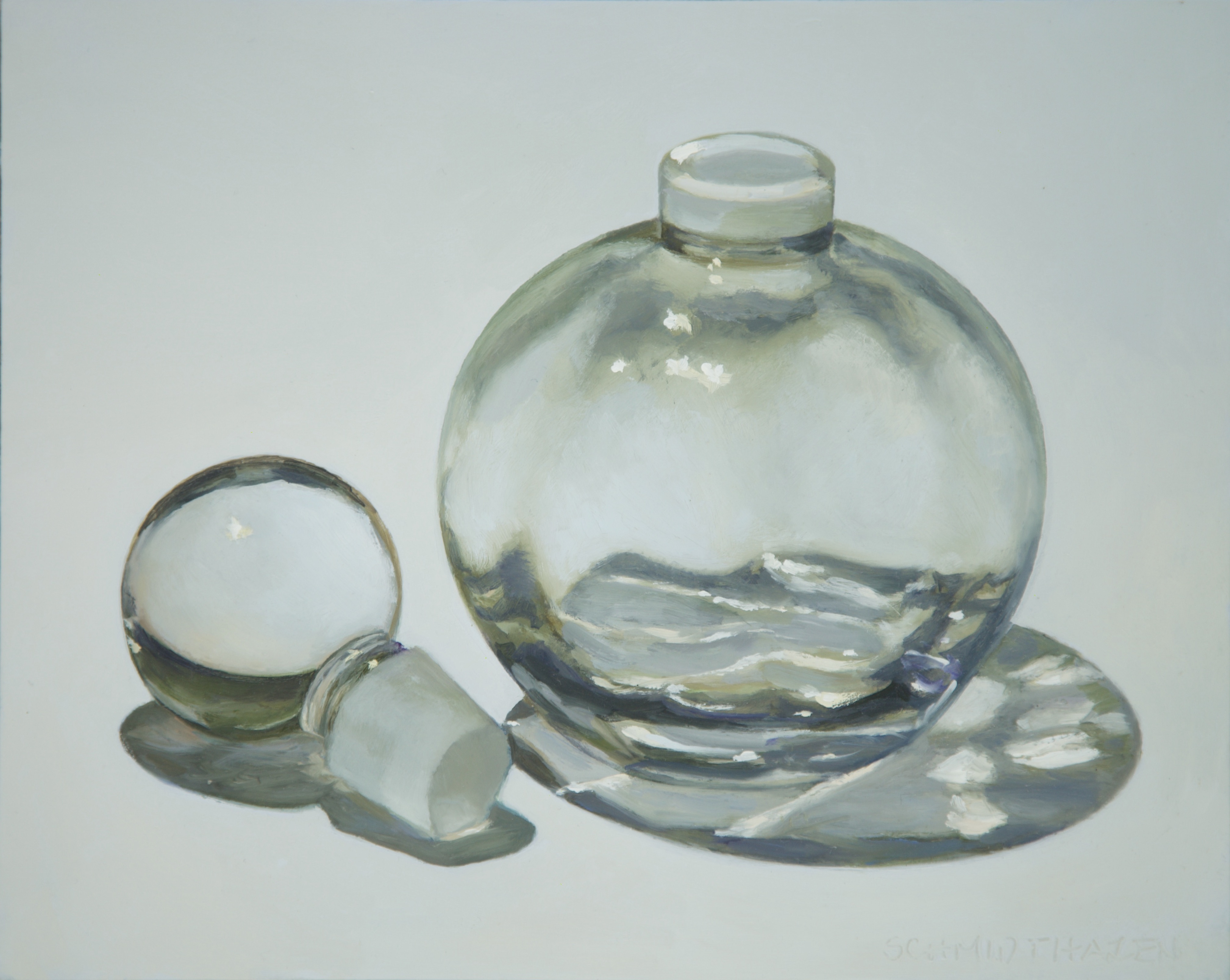 round glass bottle, lid on the side with shadows